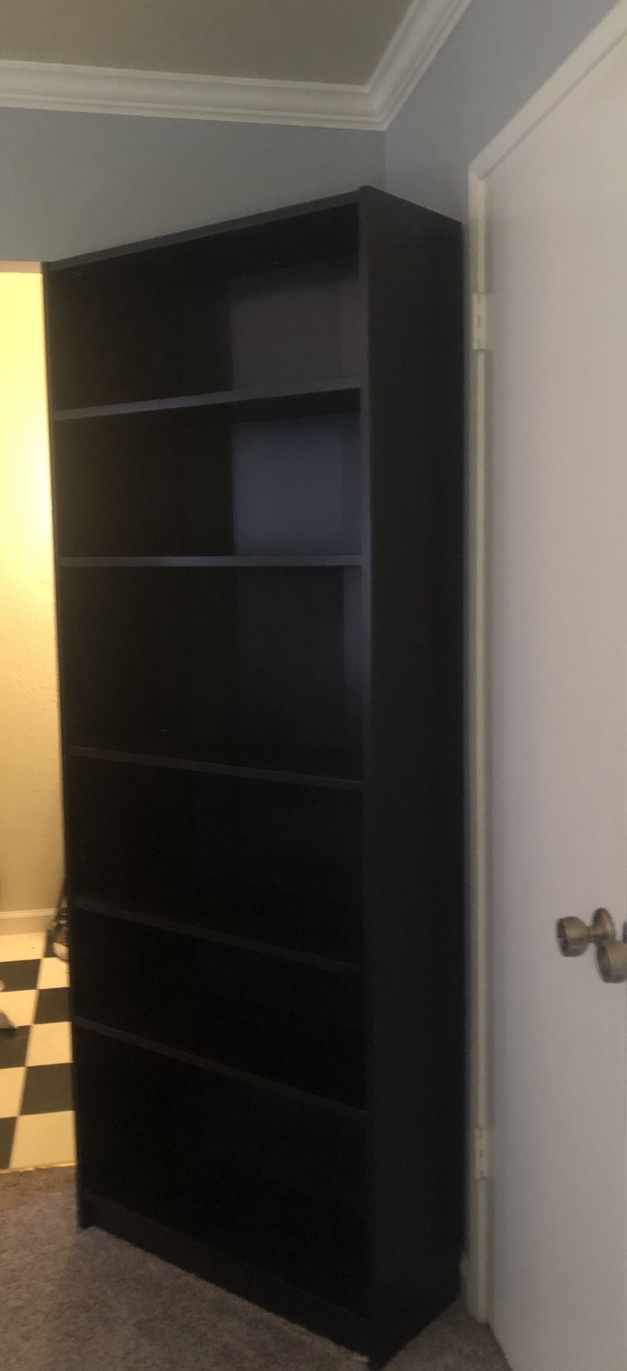 Large solid IKEA book shelf.