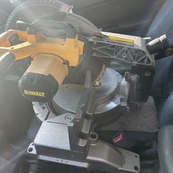 Dewalt DW 715 12” Compound Miter Saw.