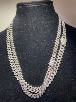 Layered Gold and Silver Cuban Link Chain Set 24” Lab diamond stones … they do not read on all diamond testers… but they do “look like money without ov