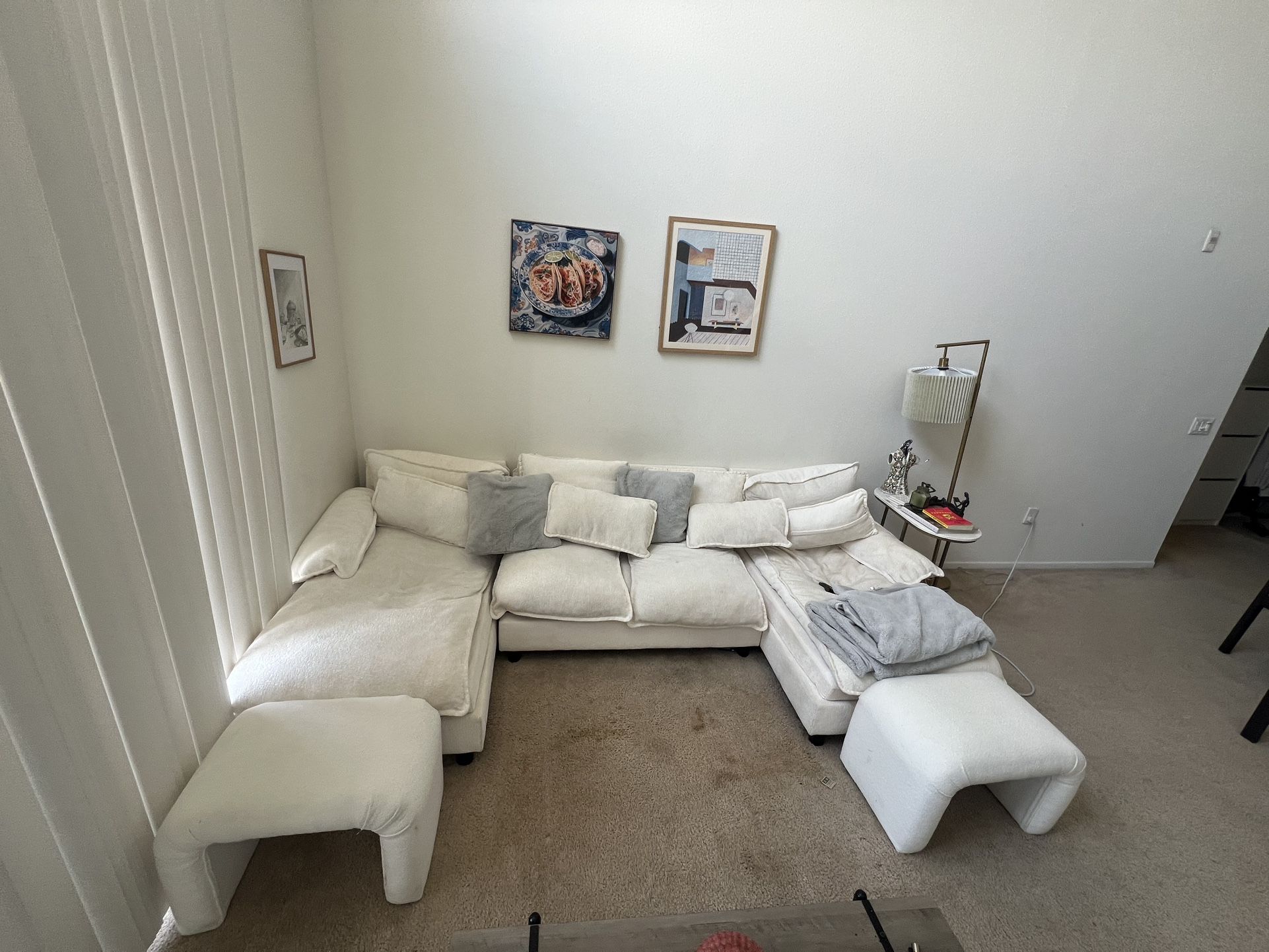 White Couch with Ottomans and Pillows