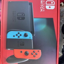 Nintendo Switch with Neon Blue and Neon Red Joy-Con