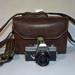 Minolta SRT 201 35mm SLR Film Camera W/ Rokkor-X 45mm Lens, Carrying Bag & Strap