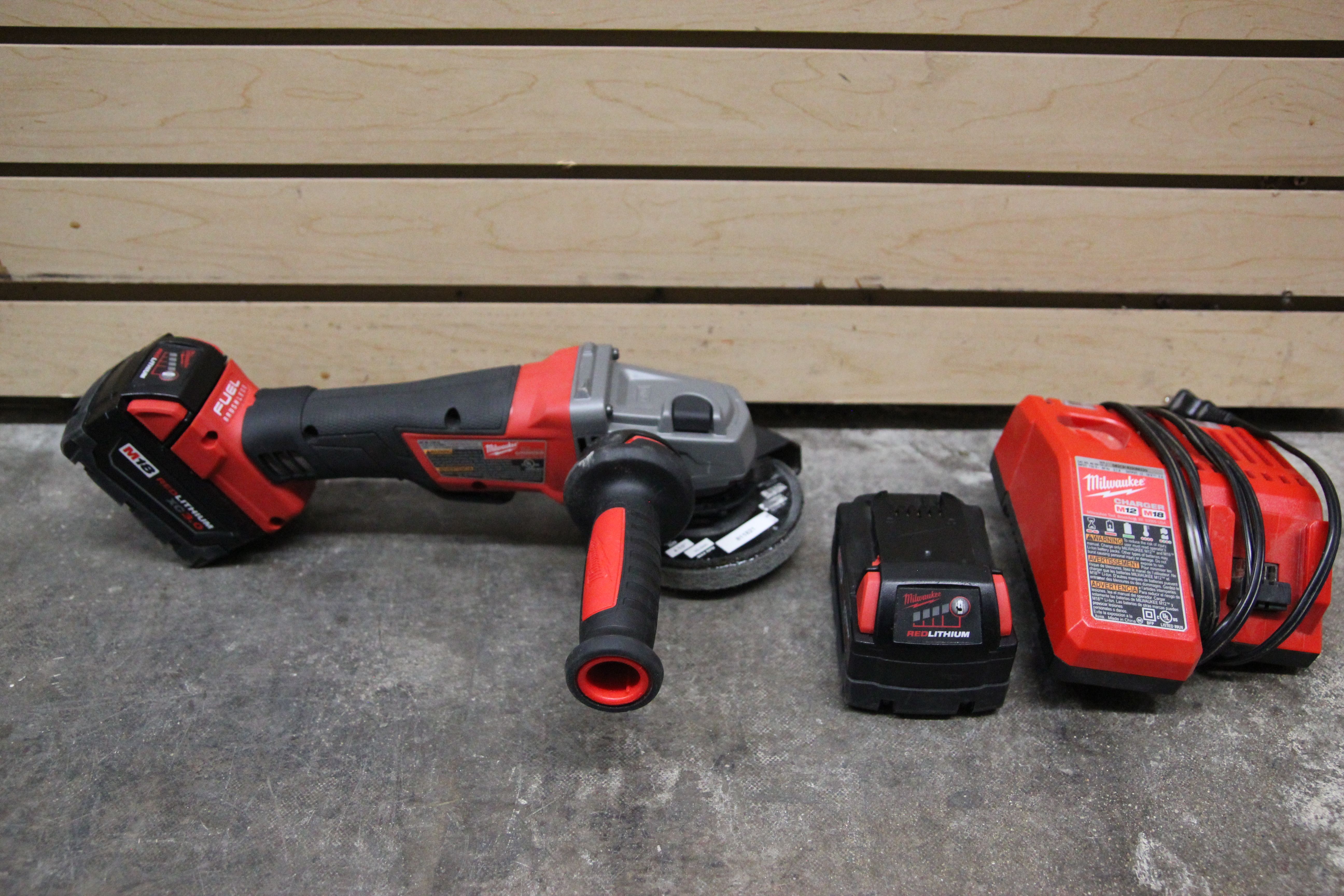 Milwaukee 2780-20 4 1/2 - 5" Cordless Disk Grinder with 2 batteries and charger