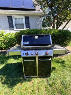 Weber Genesis E330  3-Burner Liquid Propane Gas Grill with Sear Burner and Side Burner with Brand New stainless steel grates.