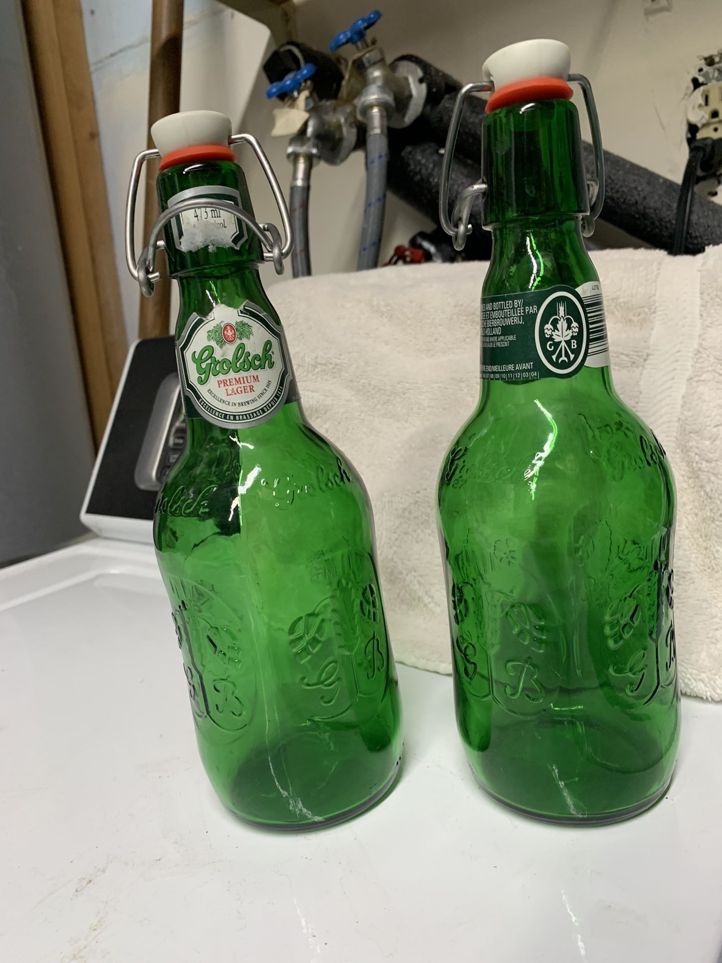 (2) Grolsch vintage green beer bottles $5 ea both for $8