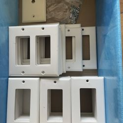 About 50 Switch plates And Screws-