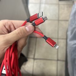 Triport Chargers equipped with three different charging heads for multiple different devices