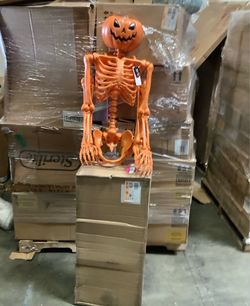 5 Ft. Posable Orange Pumpkinhead Skeleton Halloween Decoration