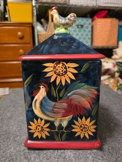 Canister/cookie jar Susan Winget with lid.   0602409