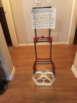 MILWAUKEE 150 LB. 2 Wheel Folding Red Dolly. 20.00, Purchased Never Used, see Pictures and details