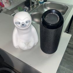 Bluetooth Speaker (Black, cylinder style) & Sloth Bluetooth Speaker (White, novelty)