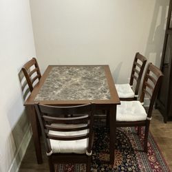 Dining Table w/ Four Chairs 
