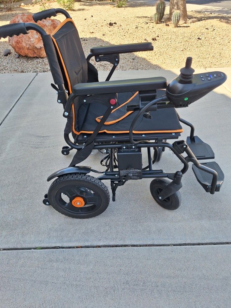 $295 PERFECT LIKE NEW!! ELETRIC FOLDING WHEELCHAIR
