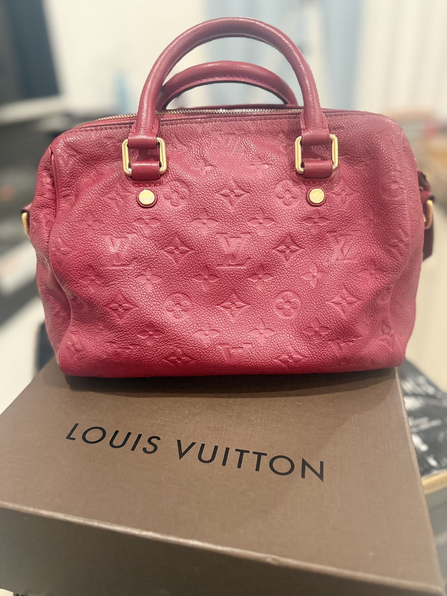 Louis Vuitton Empreinte Leather Louis Rouge Handbag
