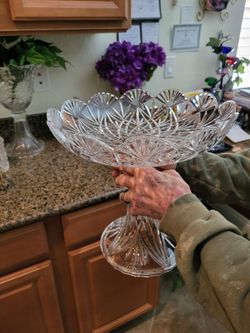 Large crystal cake plate one hundred dollars never been used perfect, very heavy.I have two left, they're each one hundred dollars