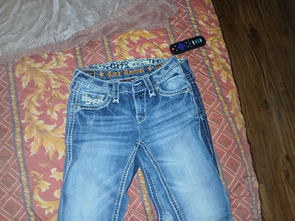 2 Pairs Of Rock Revival Jeans And1 Pair Of Real Denim Jeans