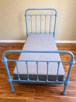 Twin metal bed