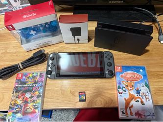The Nintendo Switch Super Smash Bros Ultimate Edition Bundle Collectible Console is a handheld system by Nintendo, featuring the iconic Super Smash Br