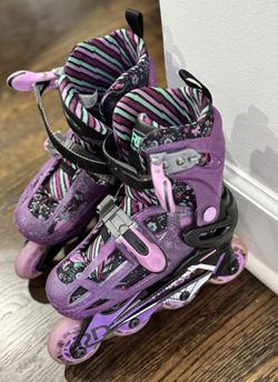 ROLLER DERBY , SIZE 12-2 AND  3-6 , PURPLE