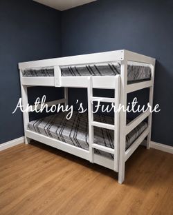 White twin bunk bed and mattress