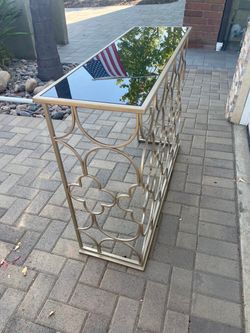 Gold Metal Console Table with Black Glass Top
