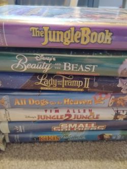13 Clamshell VHS tapes $10