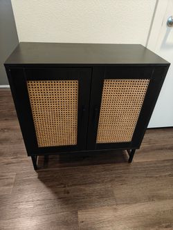 Black Cabinet with Natural Rattan Door Inserts