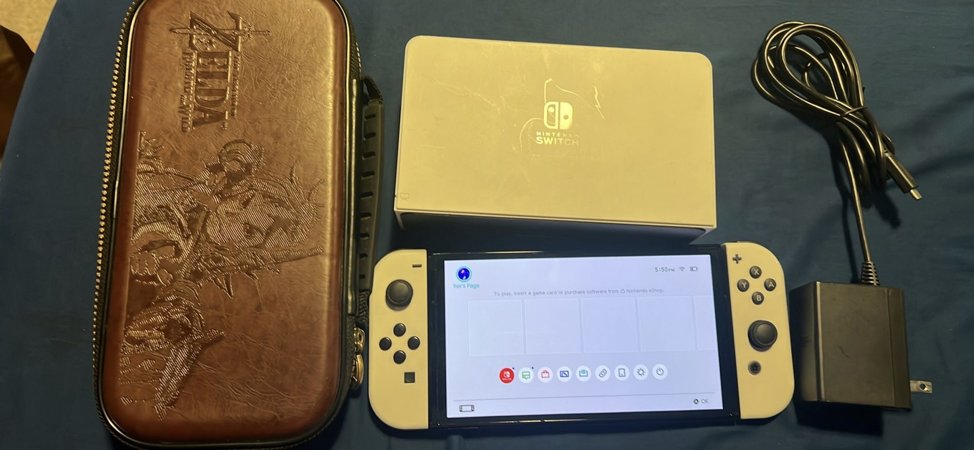 Nintendo switch oled with docking station and Zelda case