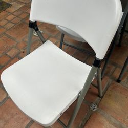 Four Folding Chairs 