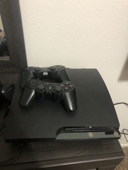 Ps3 and two wireless controller 27 games