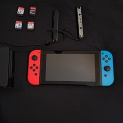 Nintendo Switch Plus 4 Games, TV Adaptor and Case