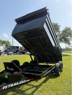 Dump trailer PJ 7 x 14 4 feet high clean title it 2025 we can take trading