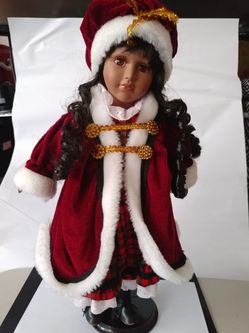 Beautiful Black Winter Doll in Red on Stand