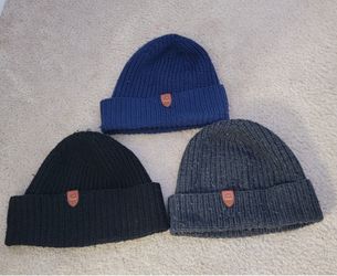3 black, blue and gray coach mens winter hats, Made from 100% wool with cow leather trim.