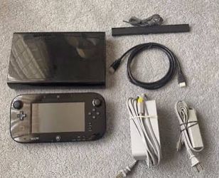 Nintendo Wii U Console Bundle with GamePad and comes with games and Wii remote