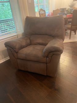 Rocker/recliner with elevating leg rest