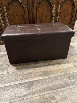 Brown faux leather storage ottoman