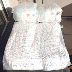 3 Sleeves Of Size 1 Diapers 