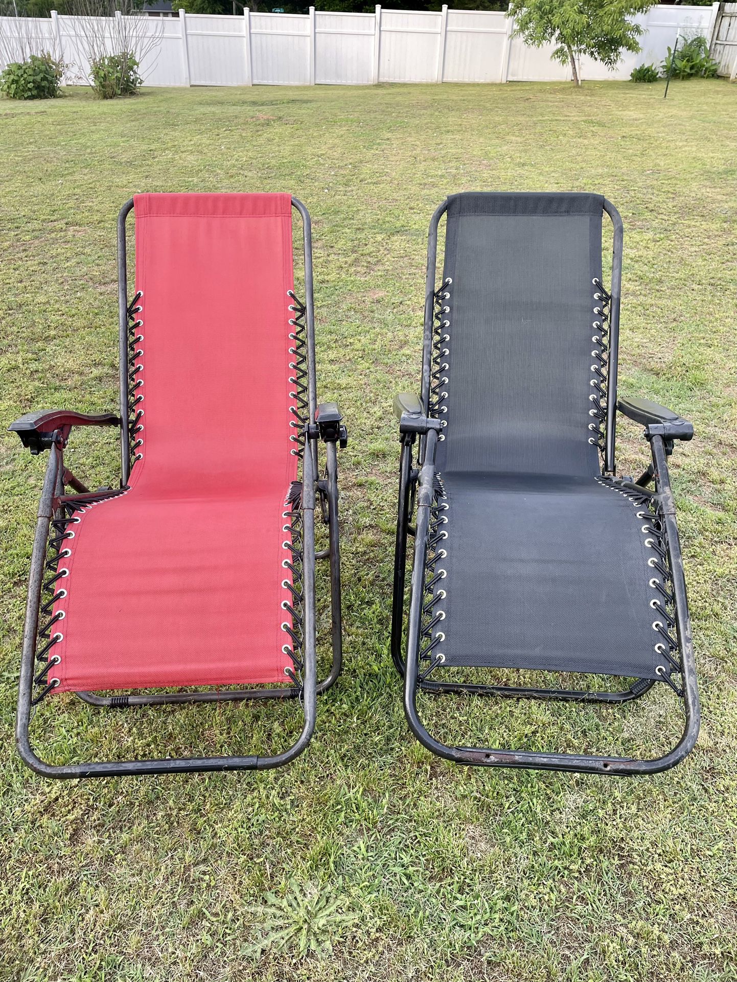 Two Zero Gravity Reclining Lounge Chairs