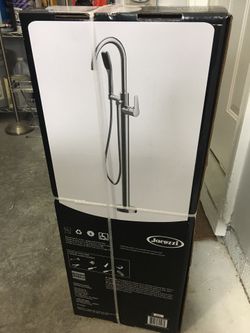 Unopened box. New tub filler. Chrome Finish