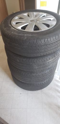 Set of tires 5 lugs like brand new .