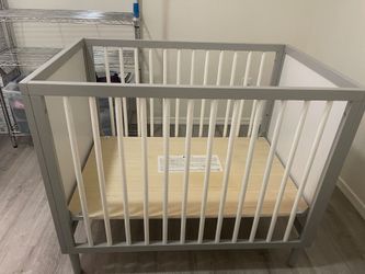Gray and White Wooden Baby Crib