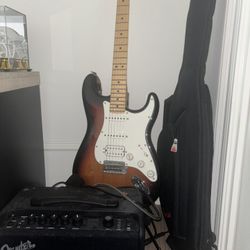 Fender Stratocaster (Case stand and picks) with Fender Mustang LT40S Amp