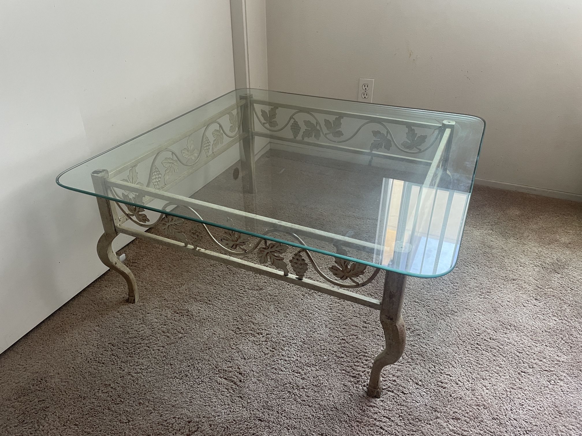 3 Glass Tables and a Brown Leather Couch