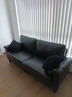 83 inch black faux leather couch with side pockets,