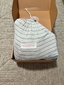 The Lolo Breastfeeding Sling