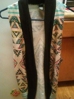Sweater vest $8 size L