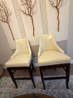 Set of Cream Color Swivel Bar Stools
