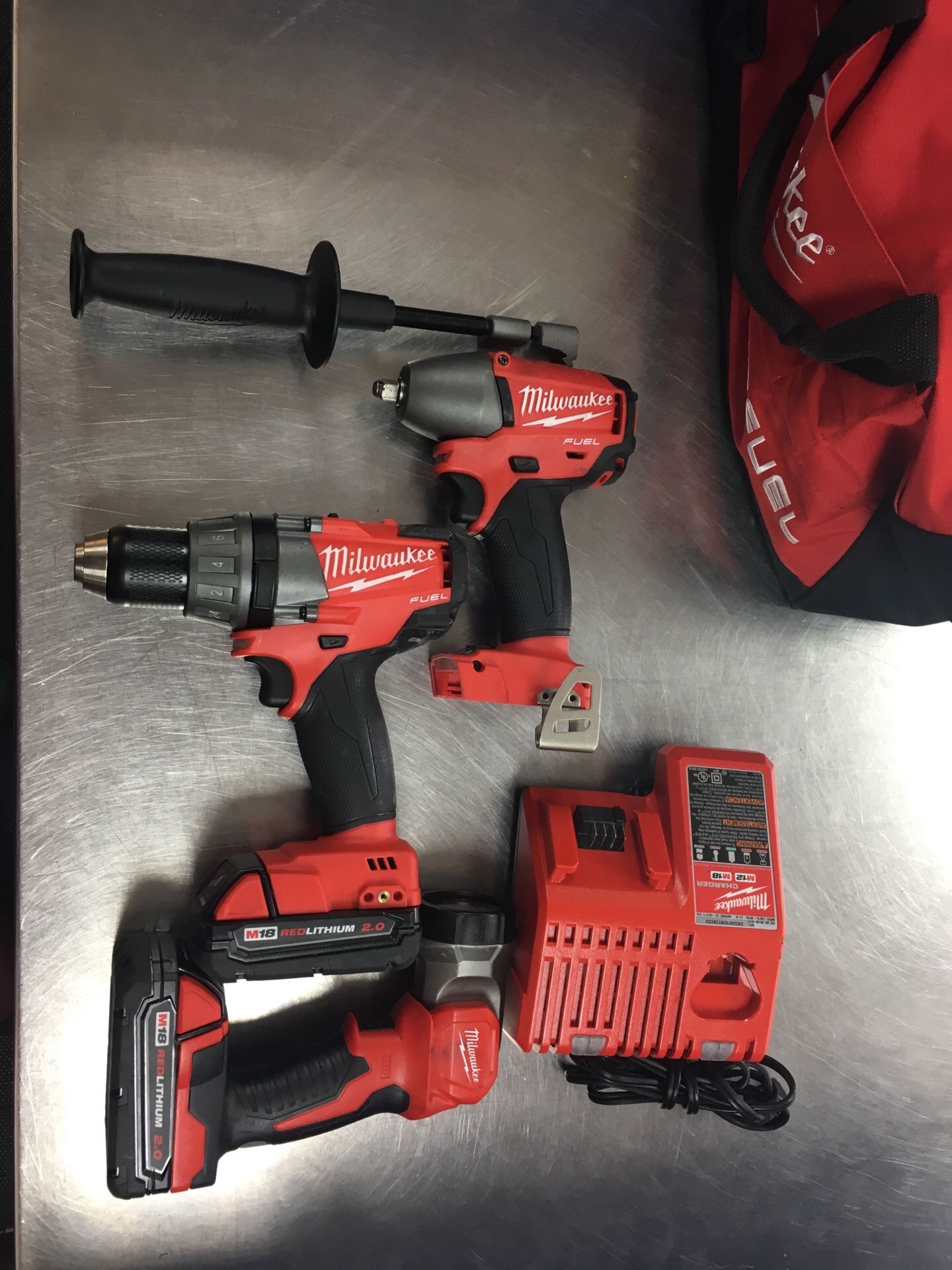 Milwaukee drill/driver, impact wrench and work light set