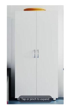 Utility wood storage cabinet. 75in tall!